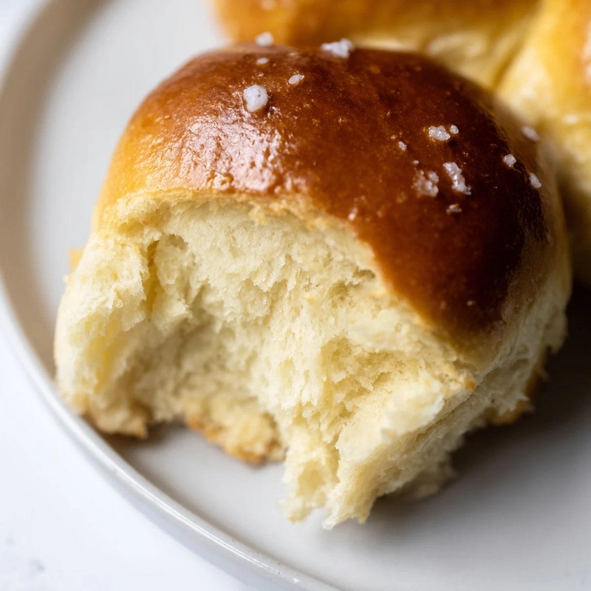 Warm buttery bliss brioche rolls brushed with egg wash and baked to rich golden perfection