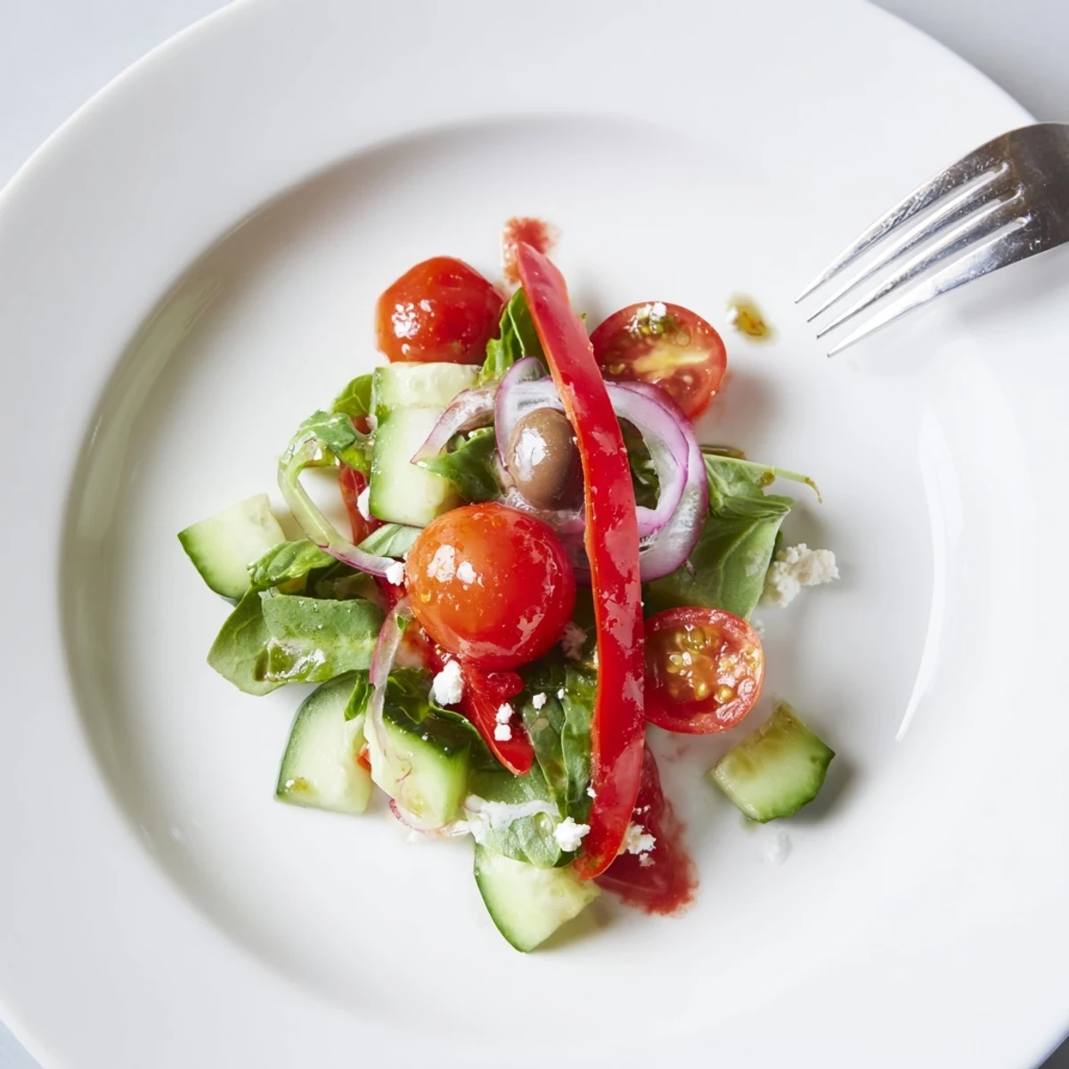 Fresh Salad Recipe with crisp cherry tomatoes, cucumber, and tangy lemon dressing.