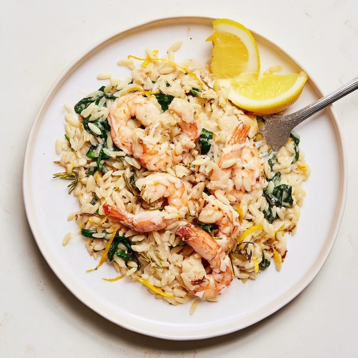 Aromatic Creamy Shrimp Orzo Recipe with wilted spinach, Parmesan, and parsley