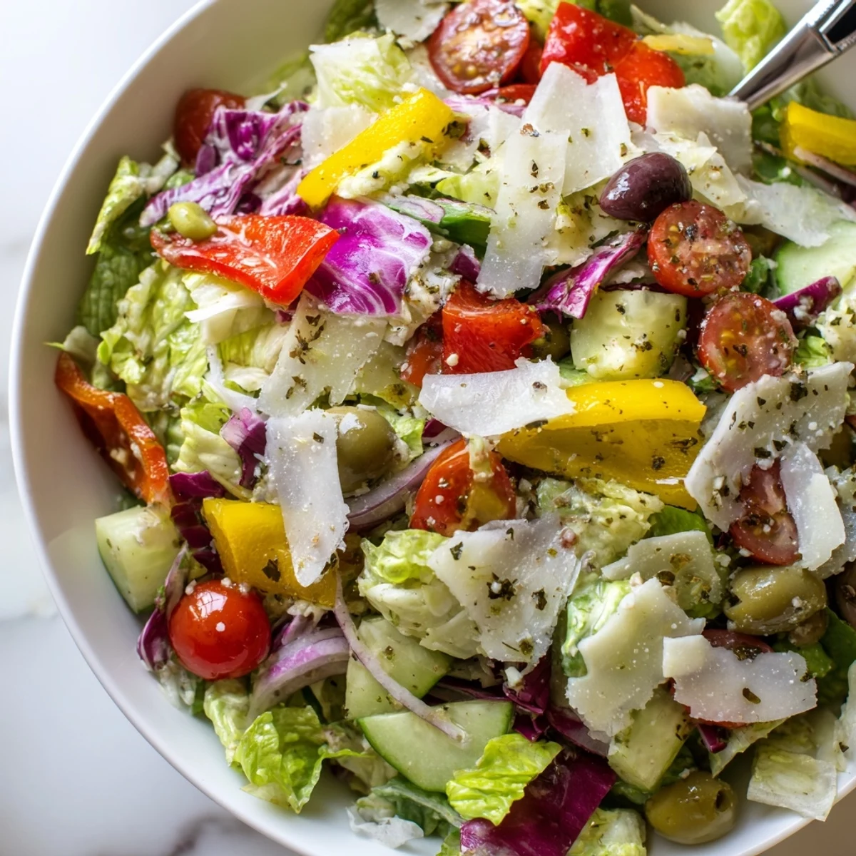 Tossed with lemon vinaigrette, Zesty Italian Chopped Salad With Parmesan And Peppers.